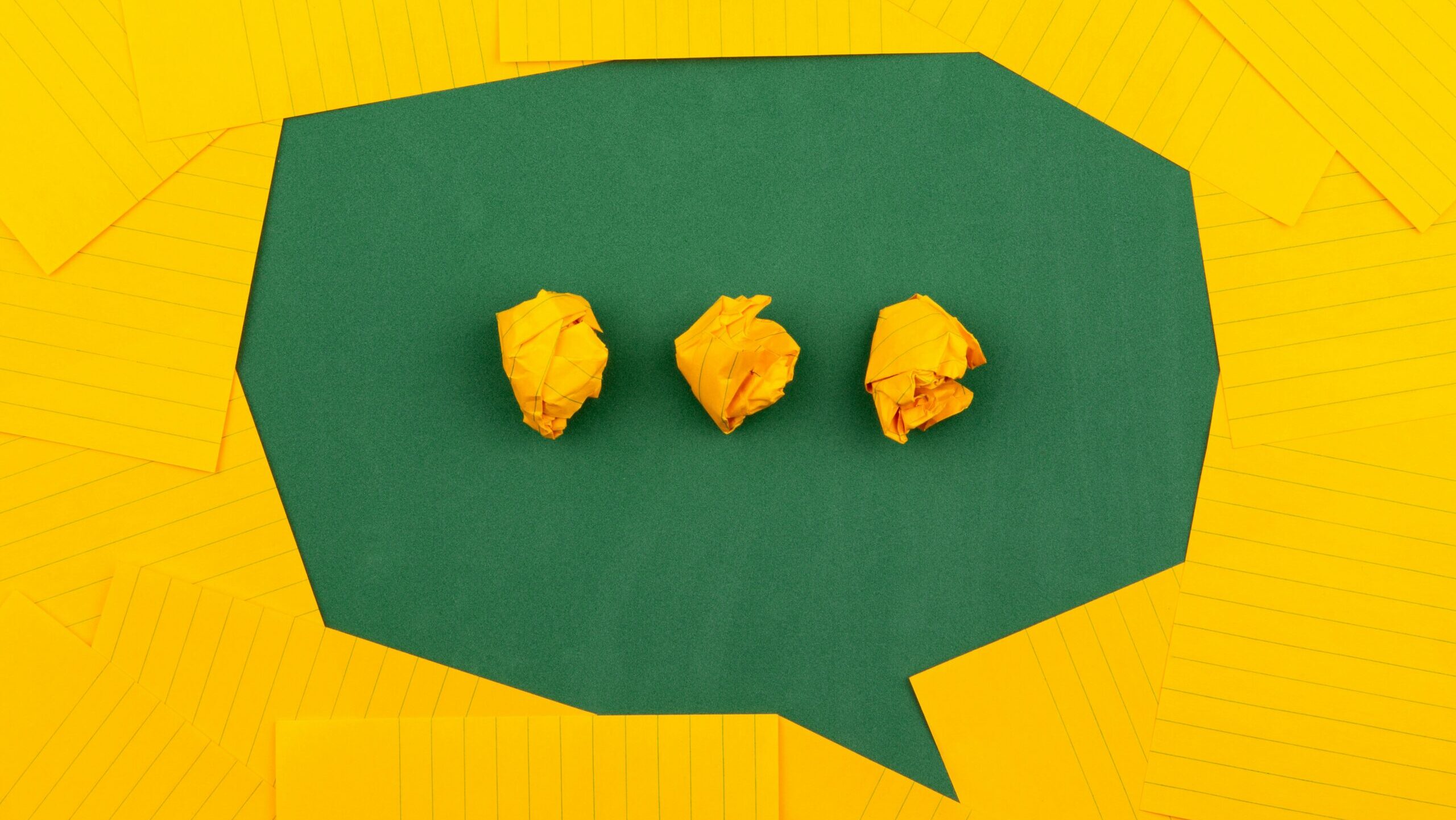 volodymyr-hryshchenko-V5vqWC9gyEU-unsplash Green speech bubble against yellow background